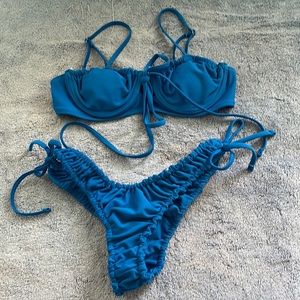 Rouched blue bikini.